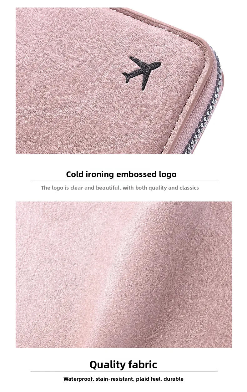Pink leather passport holder with a black airplane logo embossed on the cover
