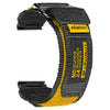 A black nylon sport strap for a watch, featuring yellow branding and a buckle.