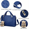 A dark blue embossed synthetic leather handbag set featuring a wallet and bear decor