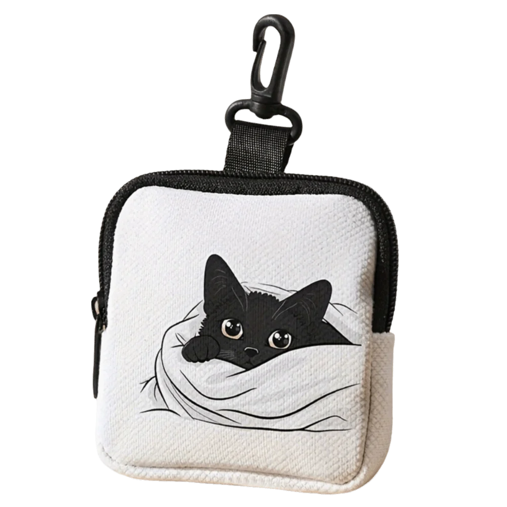 A black cat illustration on a white fabric coin purse with a black strap.