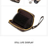 A black fashion print accordion card holder wallet displayed open and closed.