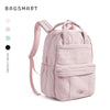 A light pink women's lightweight backpack designed for laptop and daily essentials.