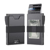 A dark gray minimalist metal card holder with an expandable backplate displaying several banknotes.