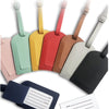 A variety of colored PU leather luggage tags displayed in a row against a white background.