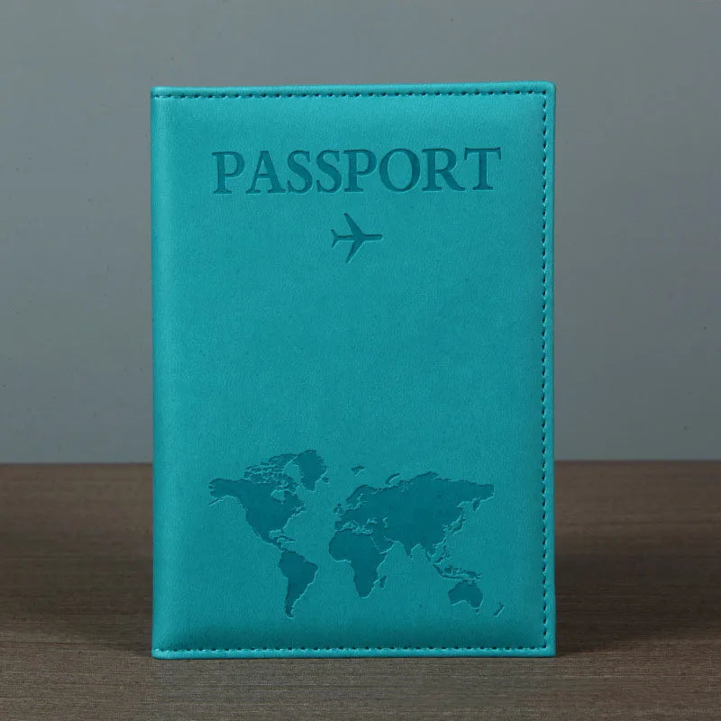 Housse de passeport en cuir PU bleu sarcelle avec la carte du monde.