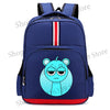 A dark blue cartoon anime backpack featuring a light blue, distressed-looking character face.