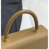 A tan Michael Kors classic letter square crossbody bag with a smooth leather handle and gold hardware.