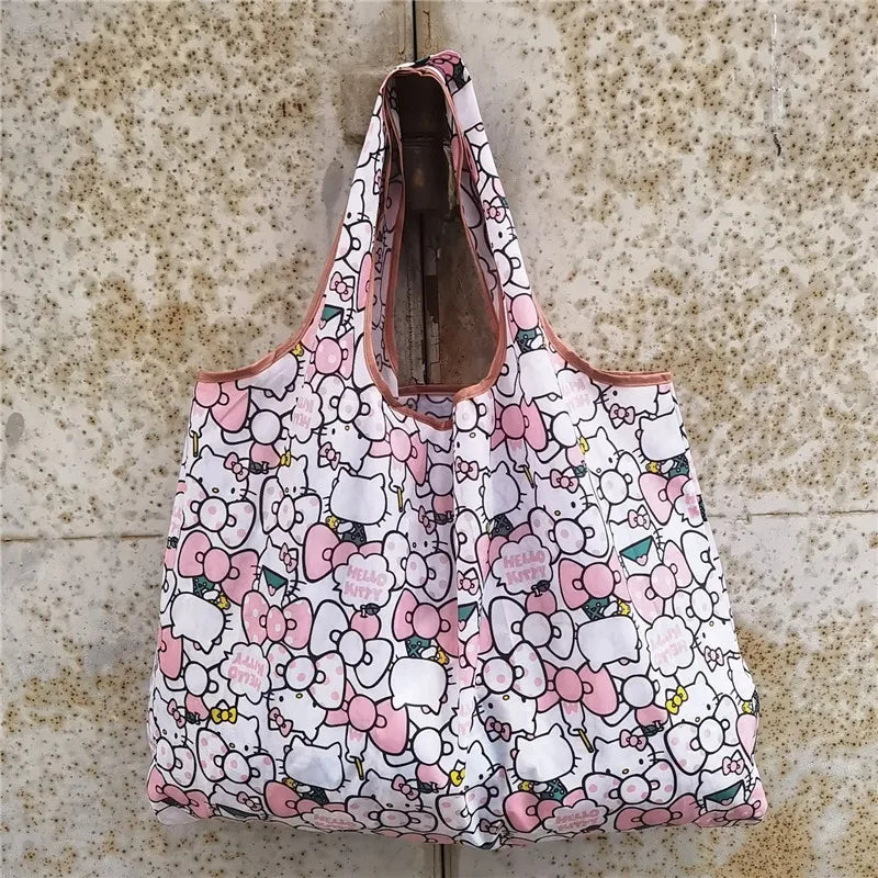 A pink and white patterned reusable shopping bag is displayed against a textured background.