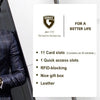 A man wearing a suit jacket and tie stands next to a product display showing a slim leather card holder with geometric design