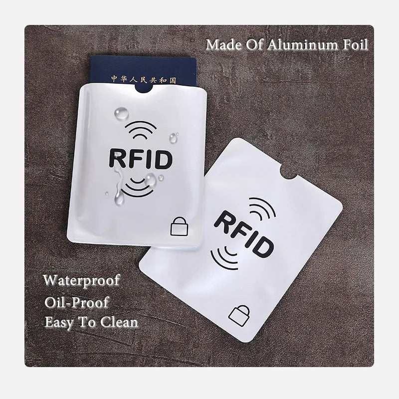 Two white aluminum foil anti-scan card sleeves with RFID protection and waterproof features