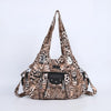 A vintage leopard print PU leather hobo shoulder bag with black trim and hardware.