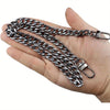 A hand holds a silver metal chain strap for handbags and wallets.