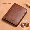 A brown tri-fold leather wallet resting on a tan surface.
