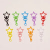 Assorted metal keychain clasp set featuring various colored star shapes and loops