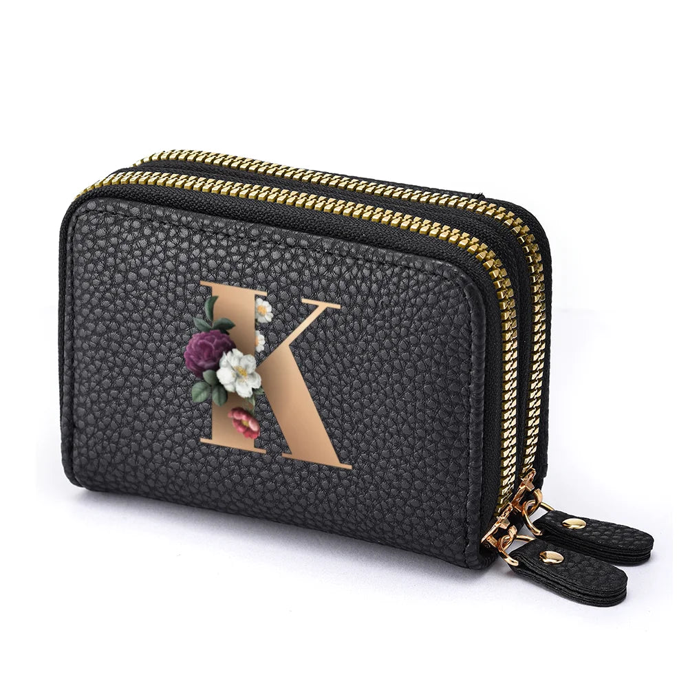 Black floral letter print mini wallet with gold zipper and leather strap