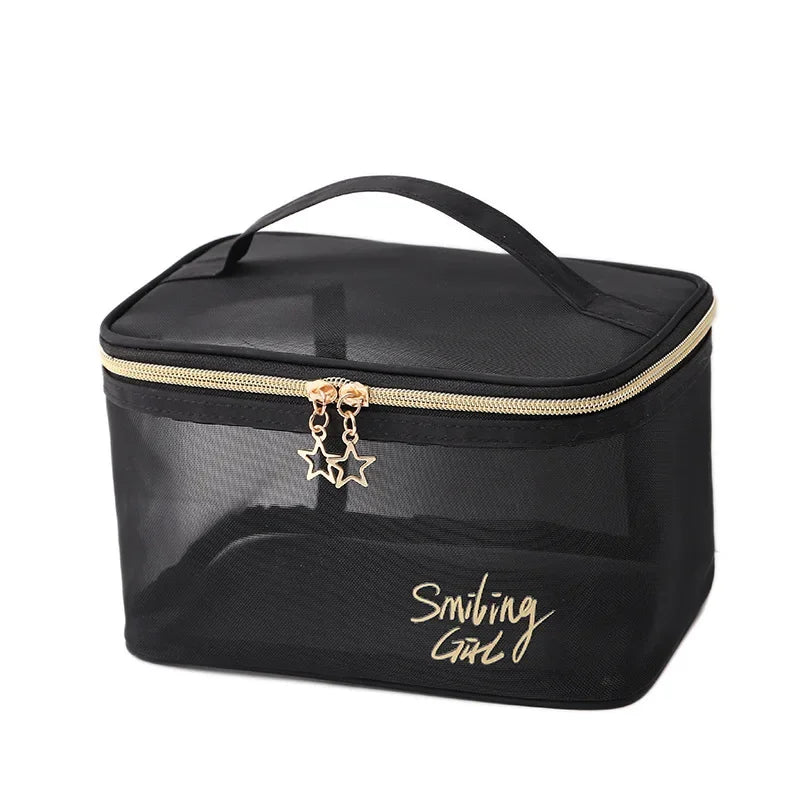 Black mesh travel cosmetic storage pouch with a gold zipper and a star charm.
