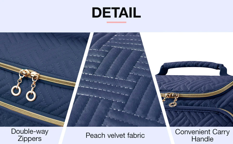 Detail shot of a navy blue cosmetic organizer bag showing double-way zippers, peach velvet fabric, and a convenient carry han