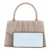 A beige shimmering textured handbag with a gold handle and a rectangular mirror detail.