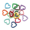 A collection of heart-shaped metal spring clasps in various colors including blue, green, orange, pink, and purple.