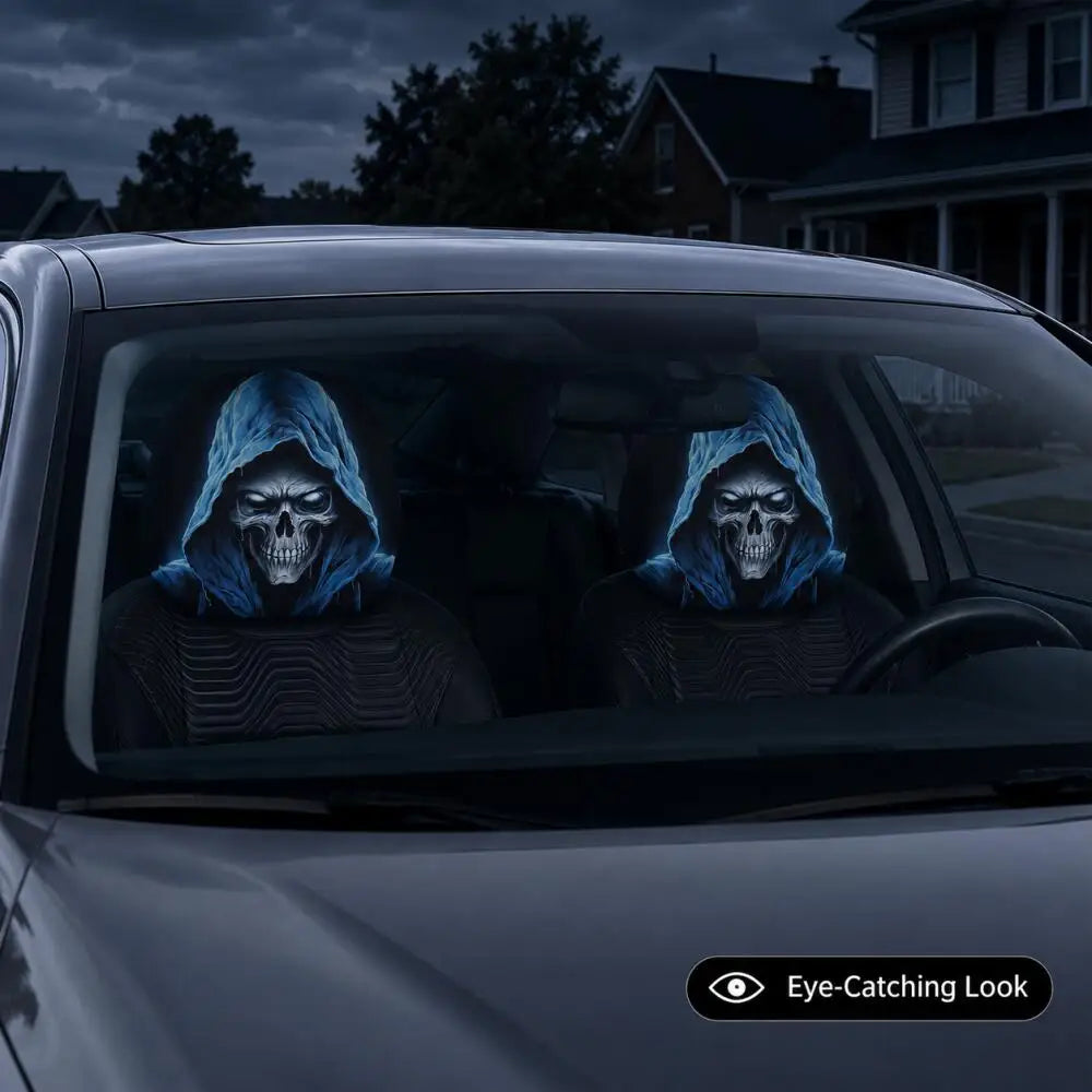 Two skull headrest covers with a blue glow design are visible inside a car.