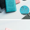 A pink leather passport holder with a clear plastic window and embossed SIM slots.