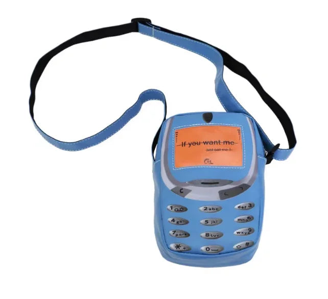A blue vintage Y2K telephone backpack with a black strap and keypad.