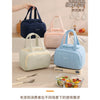 Colección de bolsas térmicas acolchadas en tonos pastel, incluyendo azul, rosa y crema.