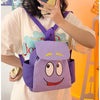 A purple Dora The Explorer cartoon flannel backpack worn by a person.