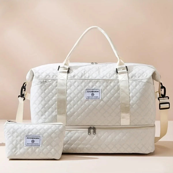 A white duffel bag with a handle and an attached cosmetic pouch is shown against a light background.