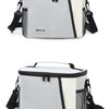 Silver and white insulated reusable lunch bag with black adjustable straps