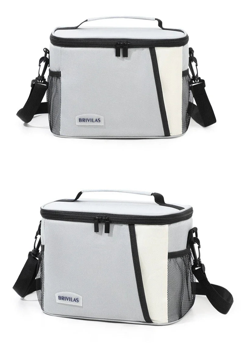 Silver and white insulated reusable lunch bag with black adjustable straps