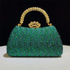 A vibrant green crystal-embellished evening clutch bag featuring a gold crown clasp and chain strap.