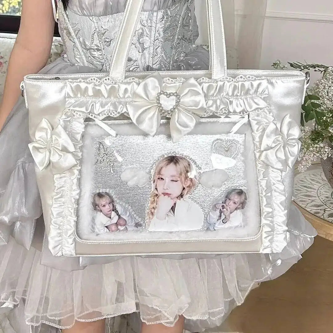 A white and silver Y2K aesthetic transparent shoulder tote bag decorated with bows and featuring a framed photo.