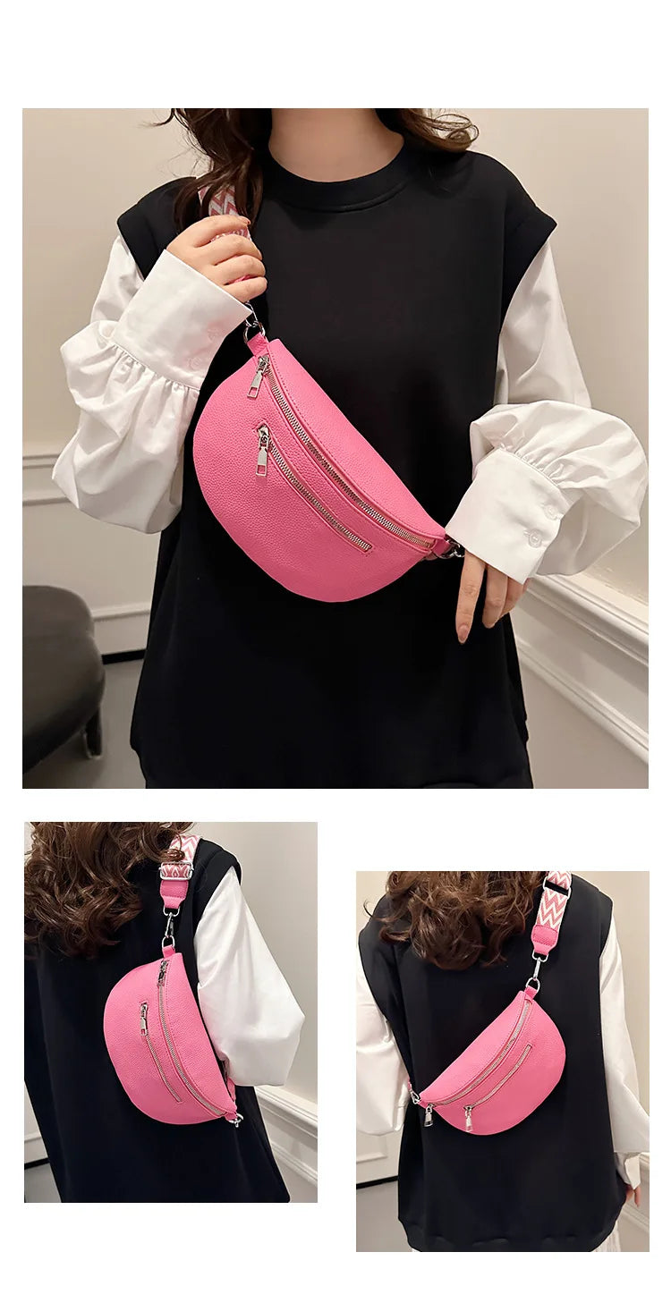 A pink PU leather multi-pocket crossbody bag is shown being held by a woman against a black top.