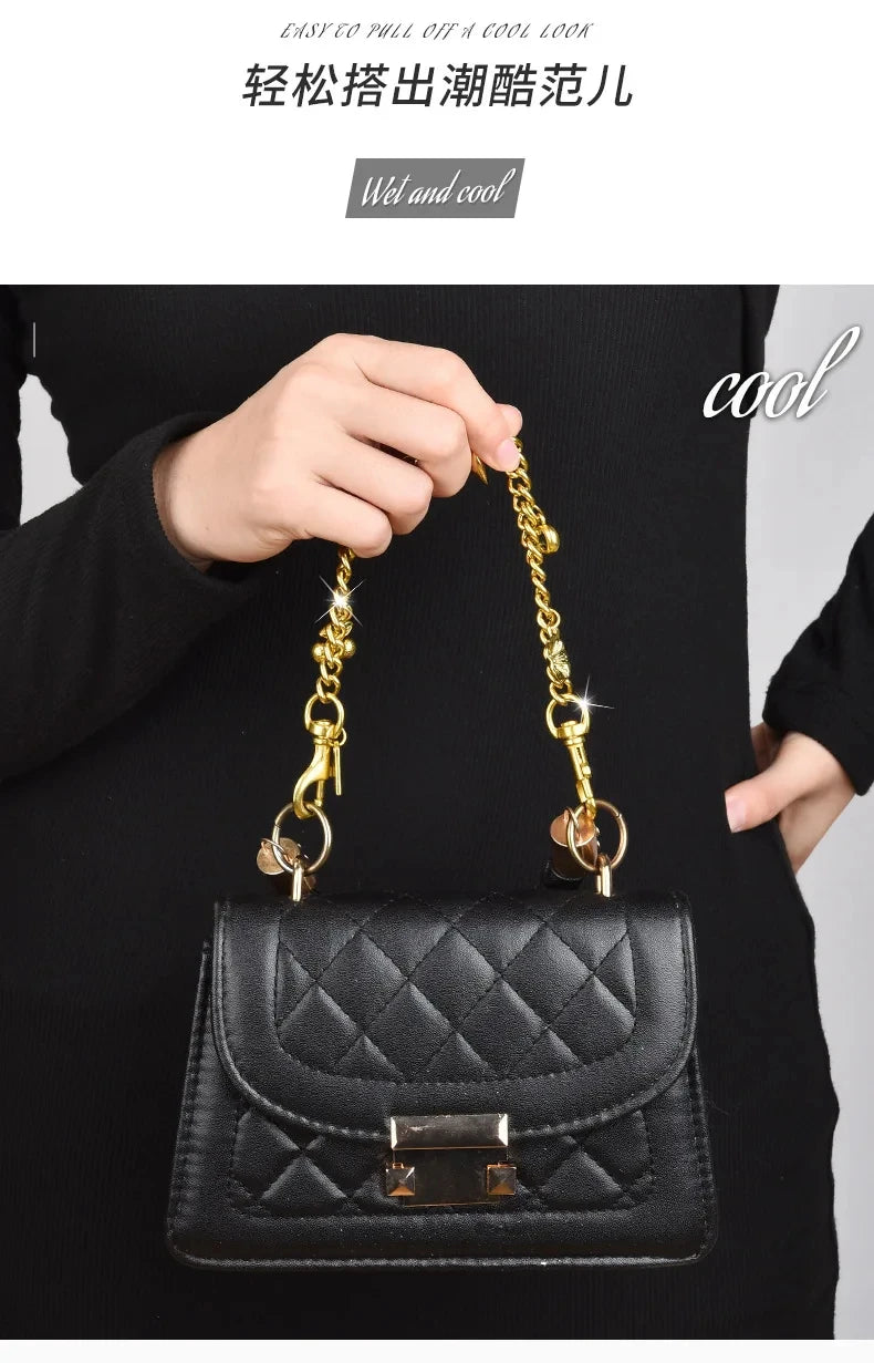 A black quilted leather handbag with a gold chain pendant is shown against a dark background.