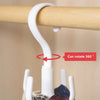 A white multi-functional hanging hook with a curved design is shown attached to a wooden rod.