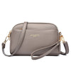 A light gray PU leather trendy shoulder crossbody bag with gold hardware.