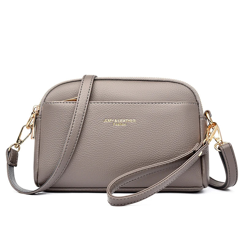 A light gray PU leather trendy shoulder crossbody bag with gold hardware.