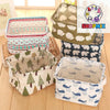 A collection of fabric storage baskets in various patterns and colors for desk organization.