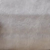 A close-up texture shot of a soft beige PU leather material.