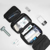 A black compartmentalized storage bag showing various toiletries and accessories organized in four levels.