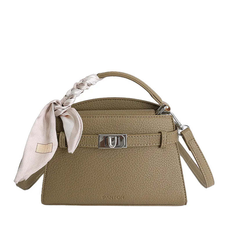 A beige PU leather crossbody clutch bag with a braided strap and silver hardware.