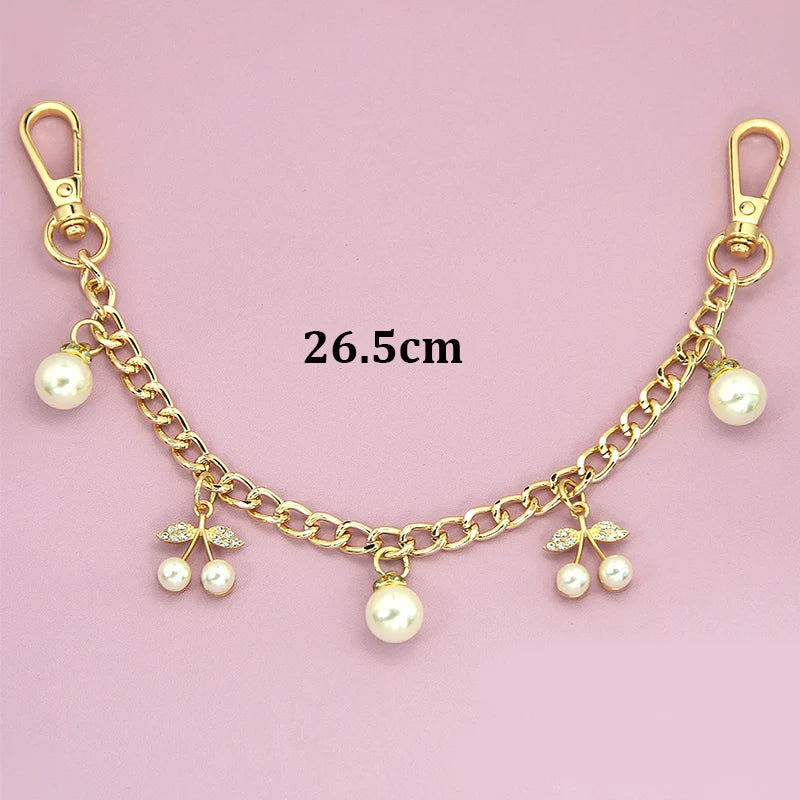 Goldkette mit Perlen- und Blumendeasen, 26,5 cm lang.