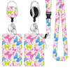 A set of pink and blue butterfly patterned retractable badge reels with silver clasps and black neck straps.