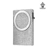 A silver magnetic card holder wallet with a textured surface and a clear circular window.