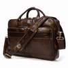 A dark brown vintage genuine leather briefcase with a leather strap is shown against a white background.