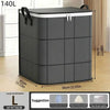 A dark gray foldable storage organizer bag with a lid and buckles shown standing upright.