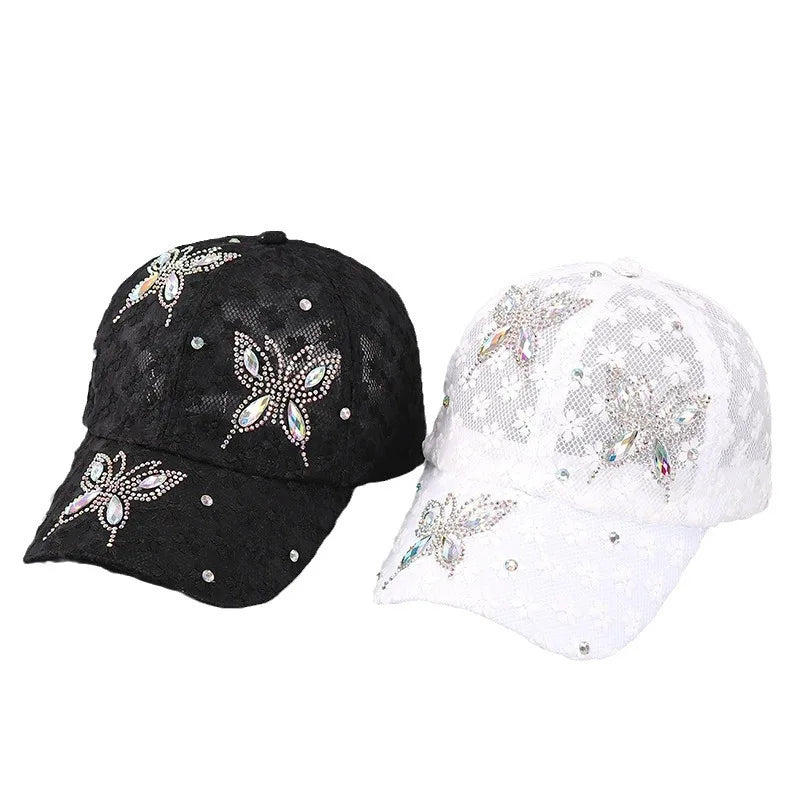 A pair of summer floral mesh snapback baseball caps in black and white.