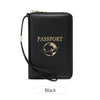 A black passport holder wallet with a wrist strap and an embossed globe design.