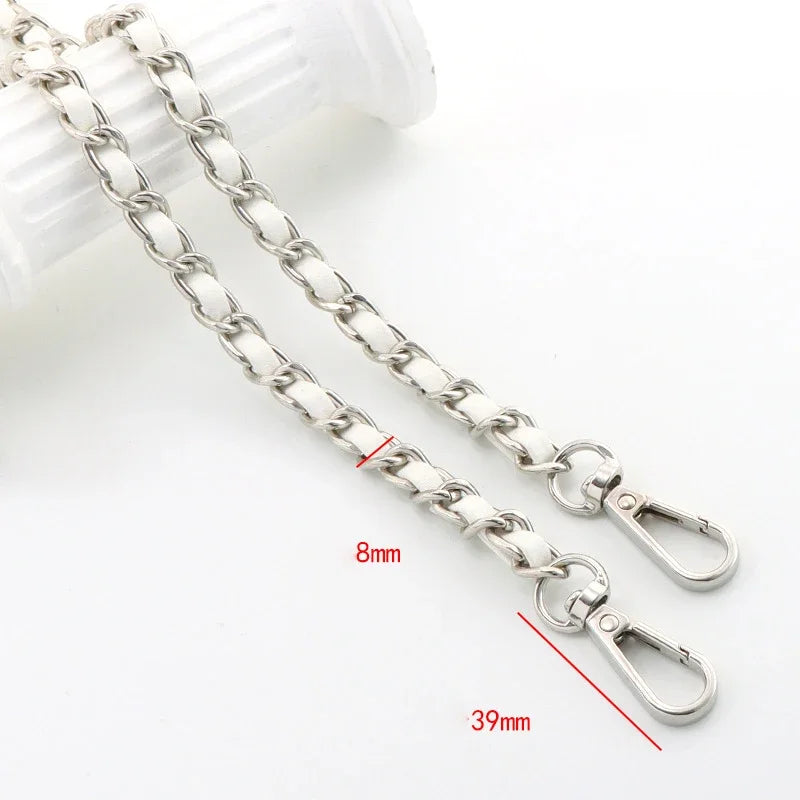 Silver metal chain shoulder strap for crossbody bags with adjustable length and clasp.